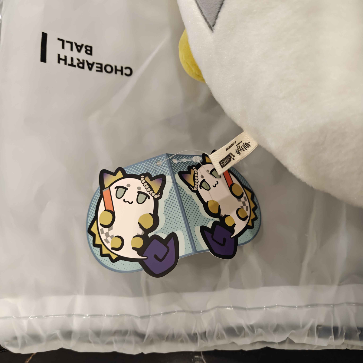 Arknights Shu bean plush doll side view showing Front Tag